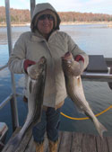 Barabara with her first stripers she caught them with Tom Reynolds Norfork stripers & STR Outfitters