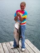 Destiny with her 19 lb striper caught with Tom Reynolds Norfork stripers & STR Outfitters